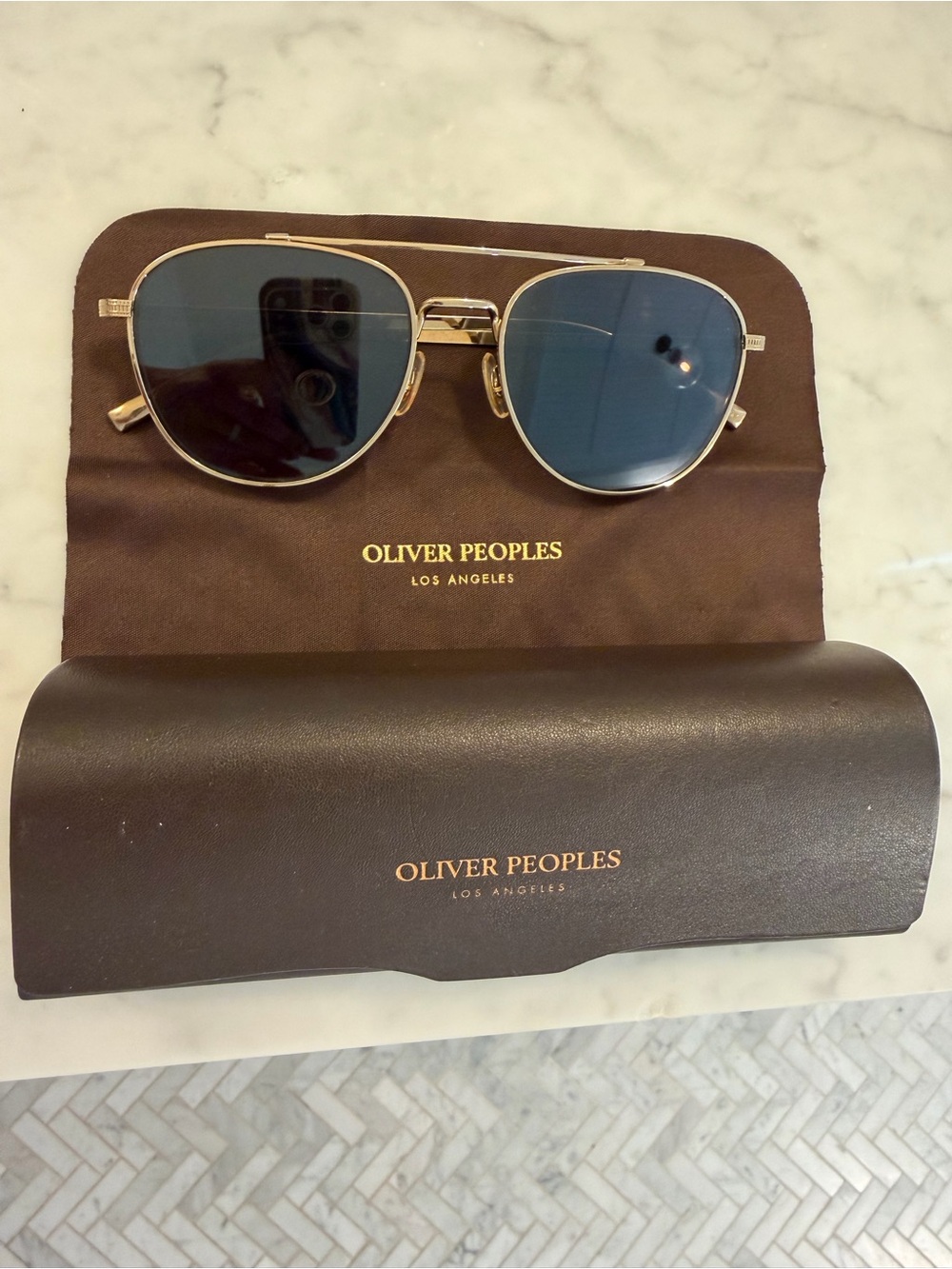 Oliver Peoples “Rivetti” Gold Frame Sunglasses with Carbon Grey Crystal Lenses